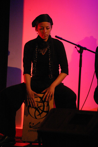 Judy Koot playing the cajón